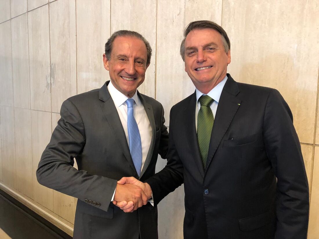 O presidente da Fiesp, Paulo Skaff, junto ao presidente Jair Bolsonaro