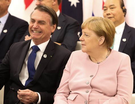 Bolsonaro e Angela Merkel no encontro do G20, realizado em julho no Japão