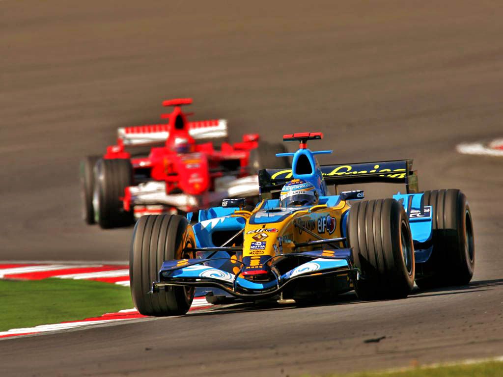 Fernando Alonso e Michael Schumacher correndo pela Fórmula 1, em 2006