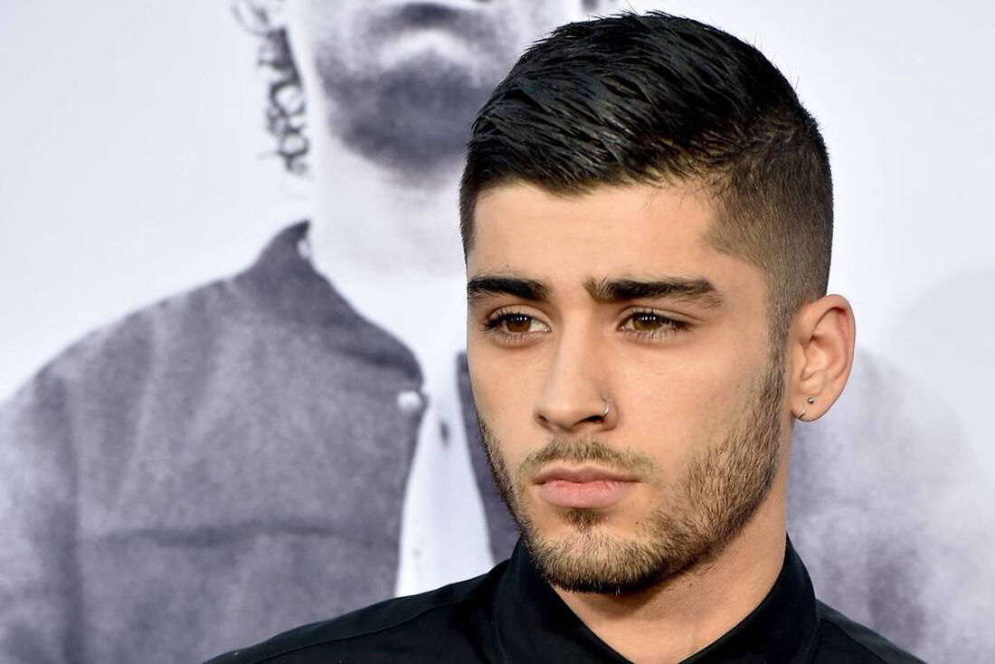 O cantor Zayn Malik chega na premiação da Universal Pictures