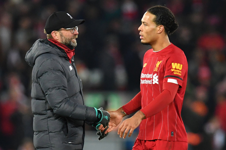 Técnico Jurgen Klopp e o zagueiro Van Dijk