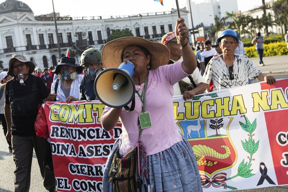 People hold a demonstration against the government of Peruvian President Dina Boluarte in Lima on January 26, 2023