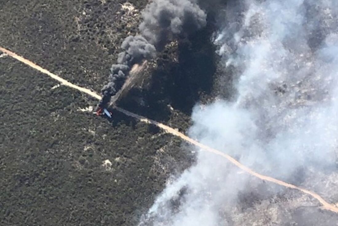 O enorme avião-tanque atingiu o solo apenas 20 segundos depois de lançar sua carga na área queimada