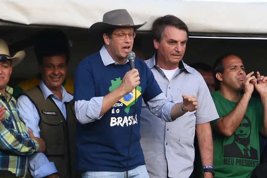 O ex-ministro Ricardo Salles e o ex-presidente Jair Bolsonaro, durante evento de agricultores