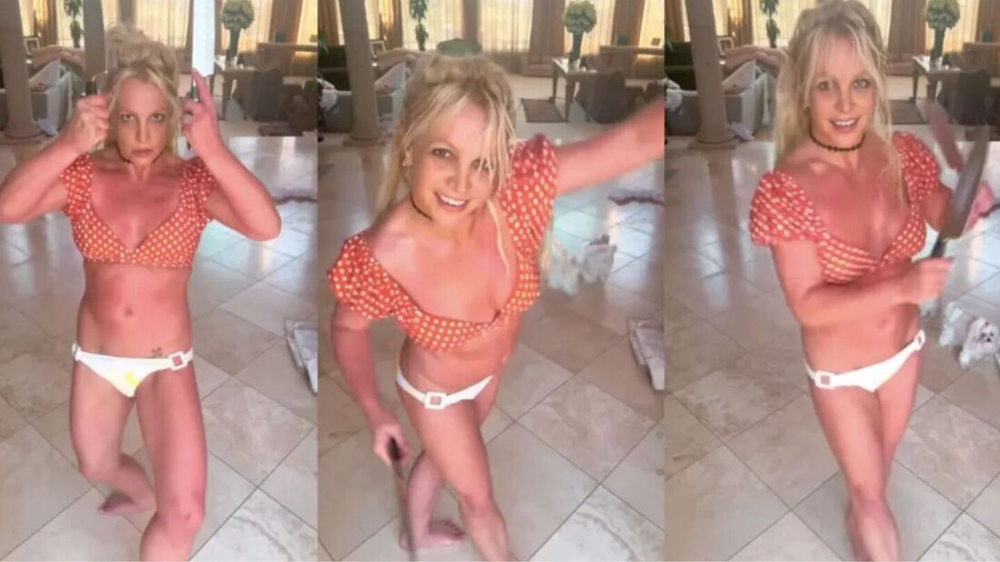 Britney Spears dançando com facas nas mãos