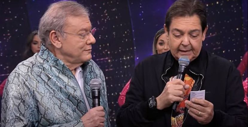 O jornalista Milton Neves, ao lado do apresentador Faustão