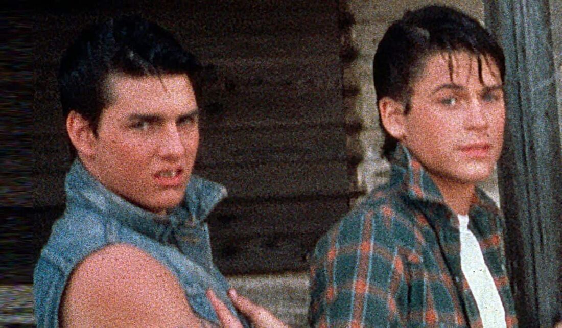 Tom Cruise (esq) e Rob Lowe (dir.) em "Vidas Sem Rumo", de 1983