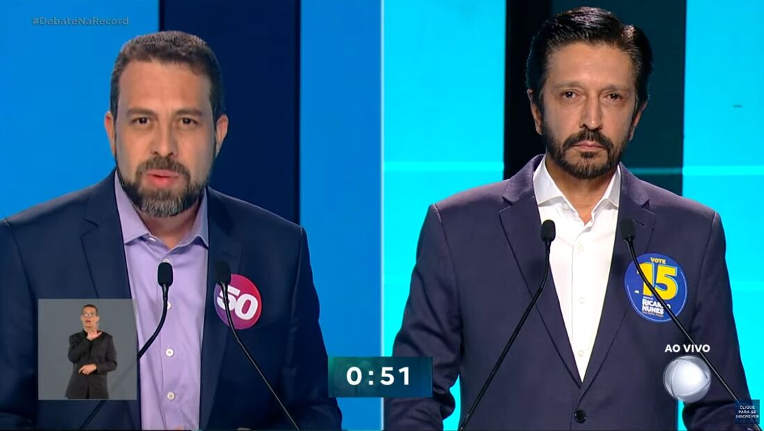 Guilherme Boulos (à esquerda) e Ricardo Nunes (à direita), durante o debate na TV Record