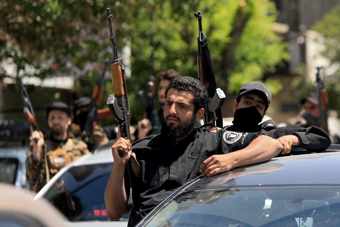 Membros das forças de segurança da Síria