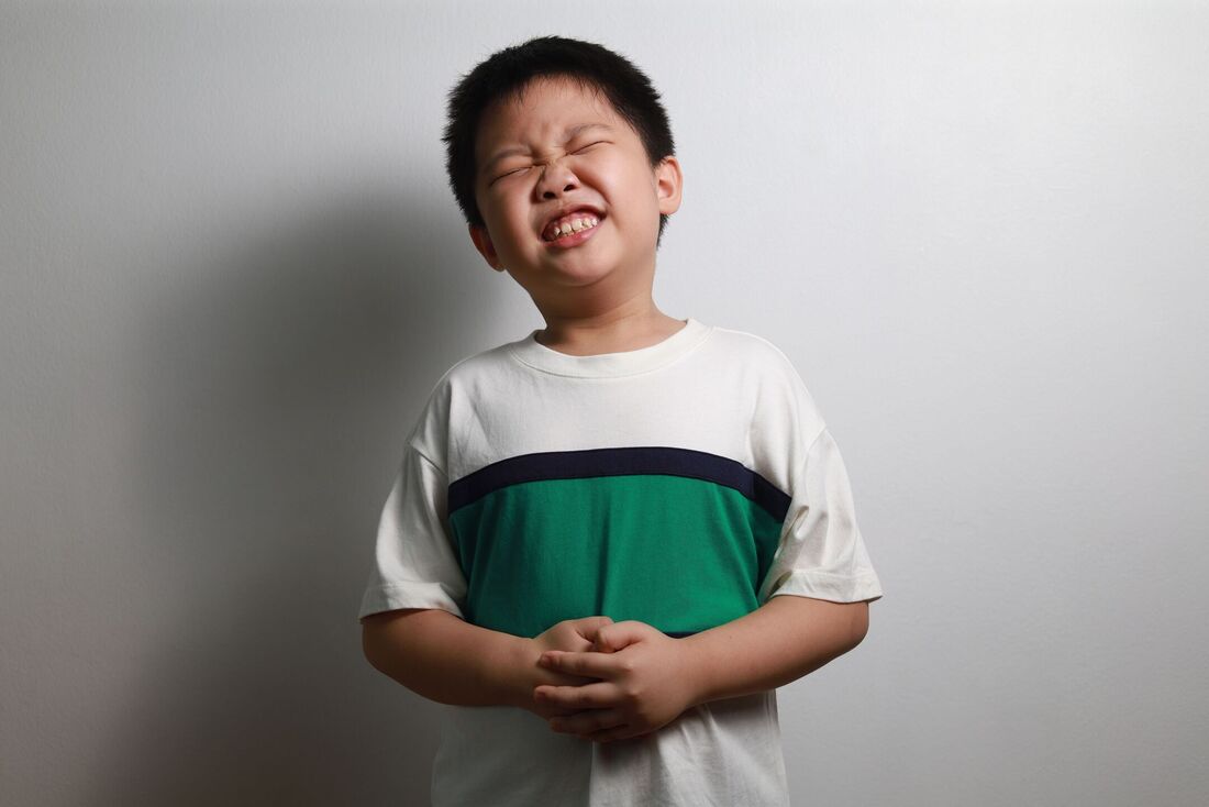Criança com dor abdominal