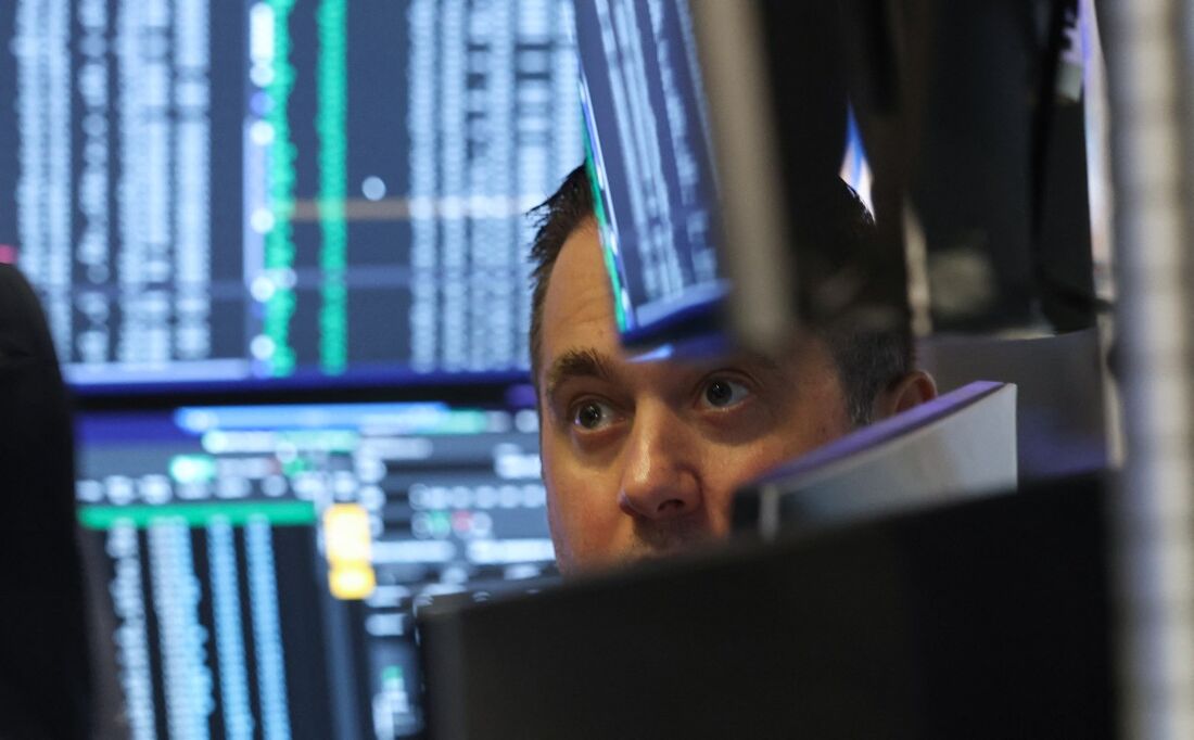 Investidor trabalhando no New York Stock Exchange