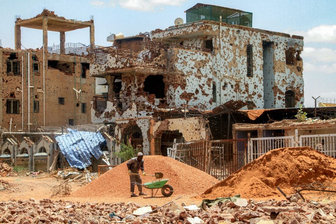 Sudaneses lutam para reconstruir capital devastada pela guerra