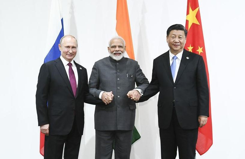 Líderes Vladimir Putin da Rússia, Narendra Modi da India e Xi Jinping da China 