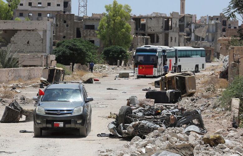 Gravações do nome filme de Jackie Chan em Hajar al Aswad | Foto: Louai Beshara/AFP