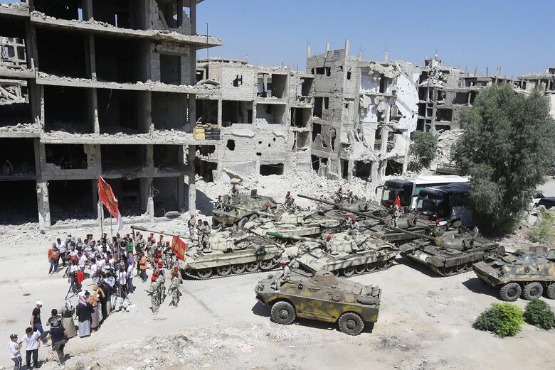 Gravações do nome filme de Jackie Chan em Hajar al Aswad | Foto: Louai Beshara/AFP