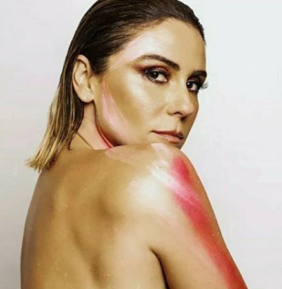 Giovanna Antonelli posou nua e pintada de rosa para lançar linha de produtos