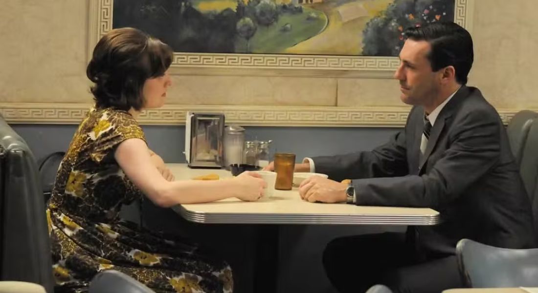 Peggy Olson (Elisabeth Moss) e Don Draper (Jon Hamm) em Mad Men