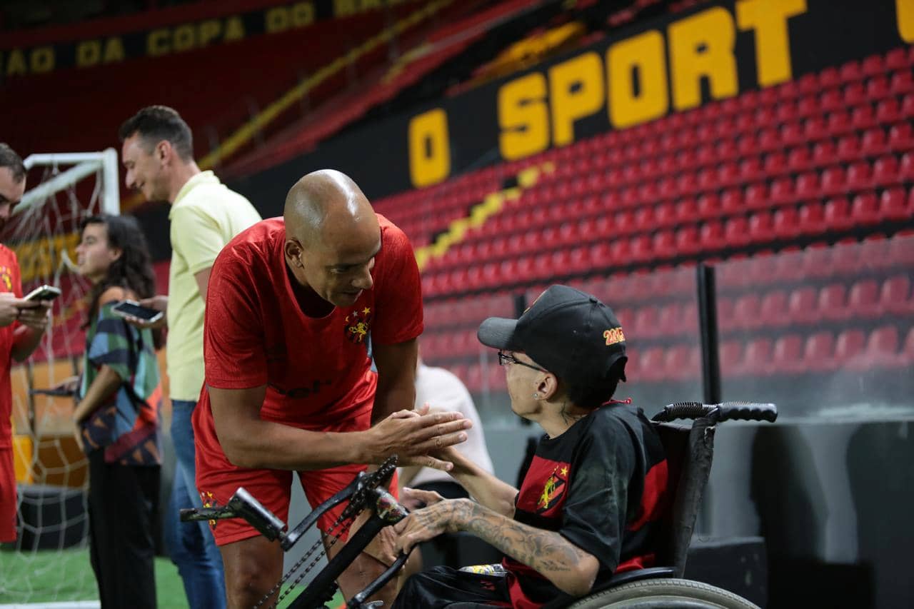 Torcedor André Lucas com o técnico Pepa 