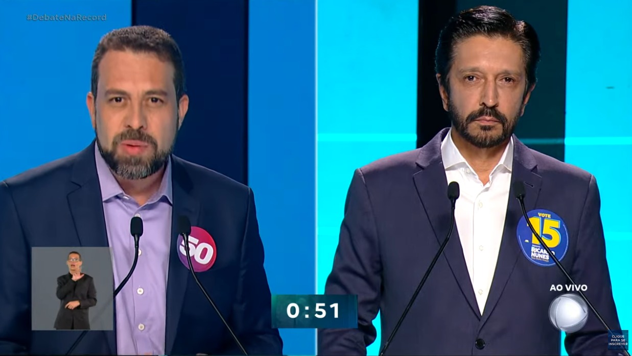 Guilherme Boulos (à esquerda) e Ricardo Nunes (à direita), durante o debate na TV Record