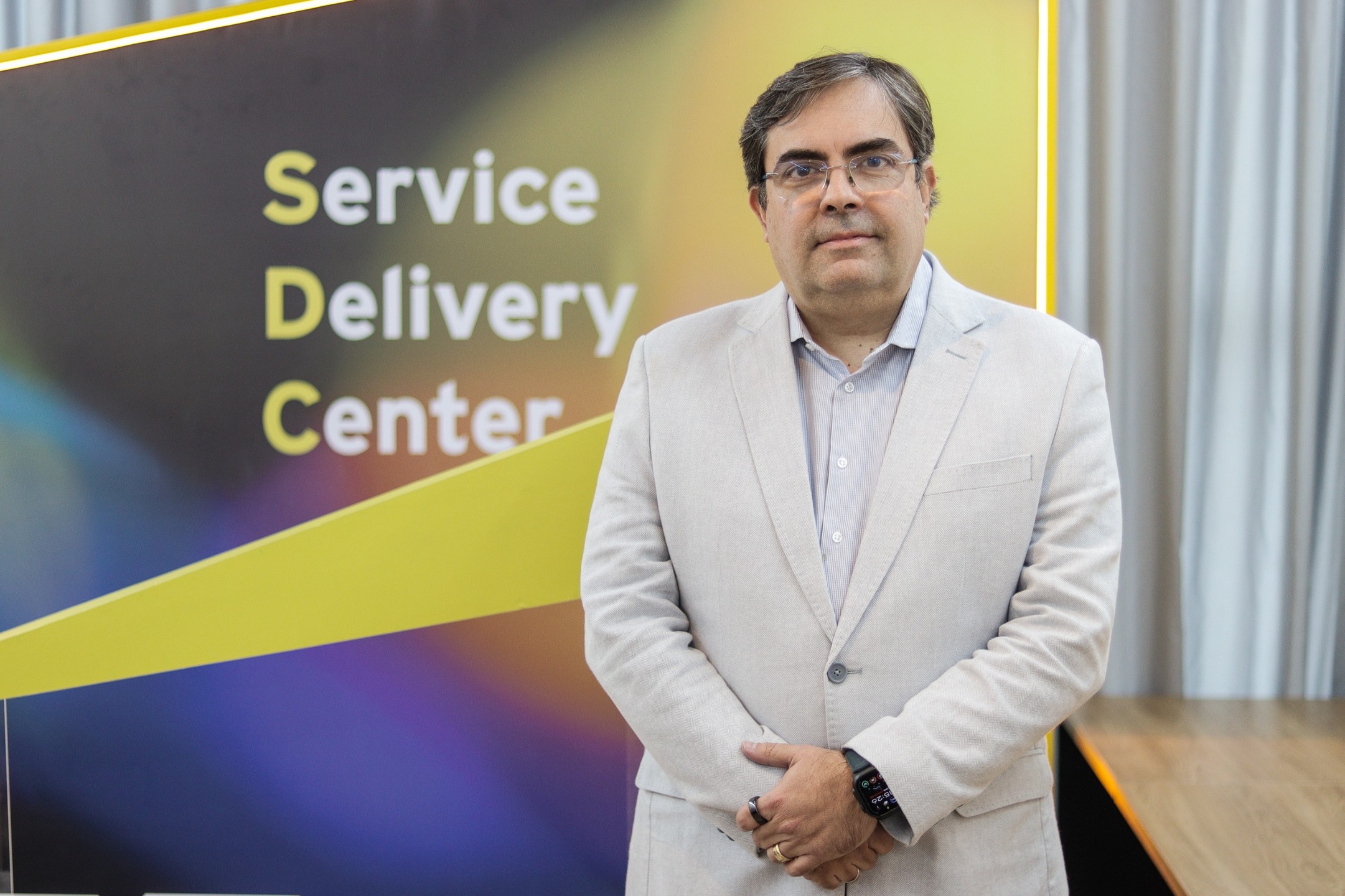 Representante da EY Brasil, Alberto Claro.